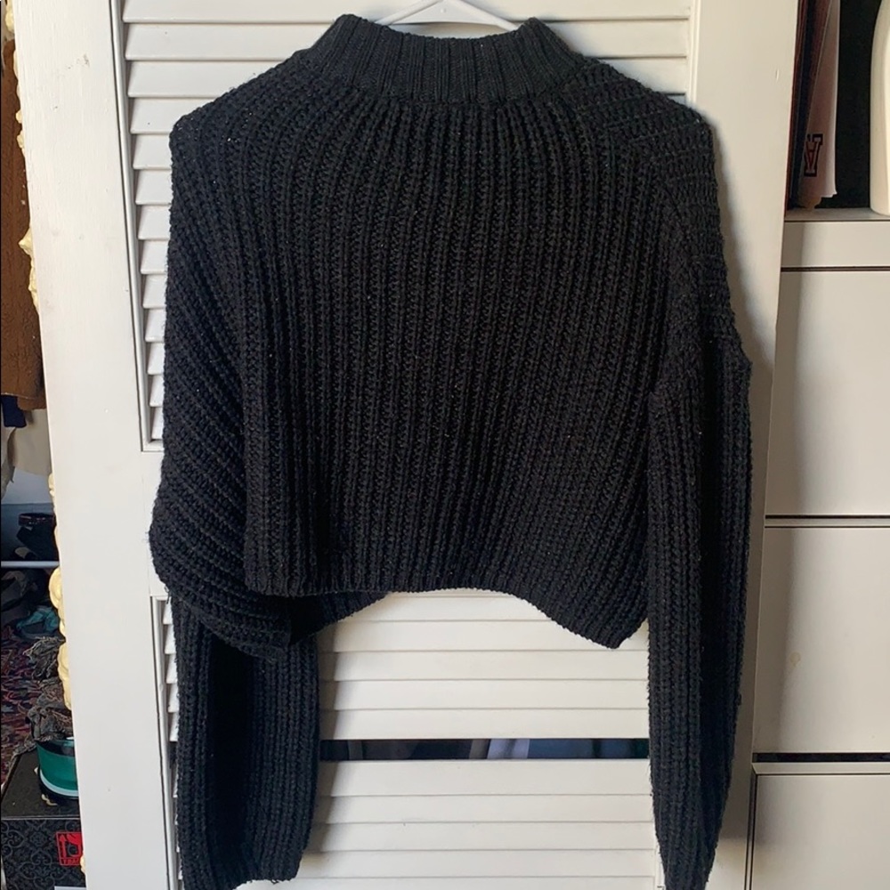 Black cropped turtle neck cable knit sweater